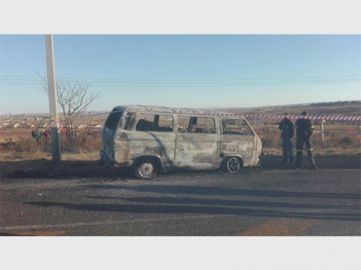 The burnt-out taxi on the side of the road. An eight-year-old boy tragically died in the incident. Photo supplied.