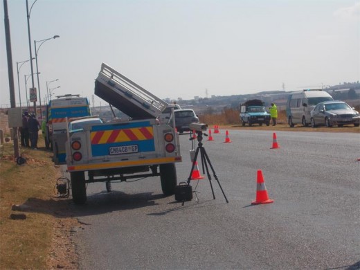 A Mogale City Traffic Department camera scans number plates and sends the data to the automatic number plate recognition technician.