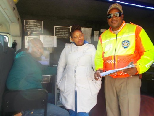 Automatic Number Plate Recognition technician Richard Sengwana, with cashier Keboneng Gaditshose, and traffic officer Eric Qweta.