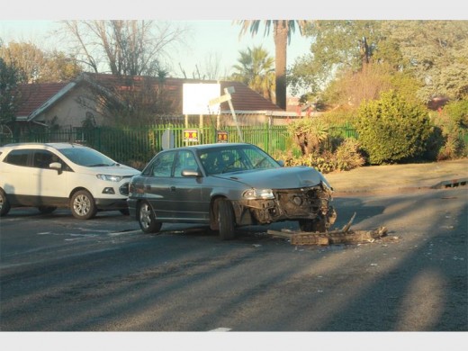The badly damaged Opel after colliding with a motorcycle.