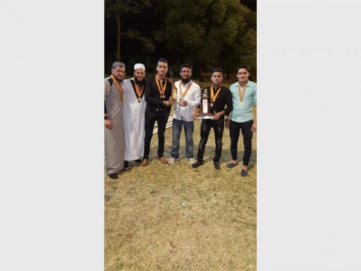 Zubair Bhayat, Bilal Kotwal, Faizal Bemat, Baboo Bhayat, Fareed Bemat and Yahya Bemat with one of the evening's awards.