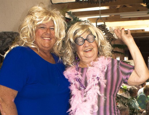 Trudie Naudé having some fun with one of the residents of the old age homes.
