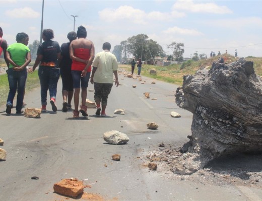 Tudor Road was completely unaccessible on Friday, 11 November due to angry Tudor Shaft protesters barricading the road with rocks, burning tree stumps and tyres.