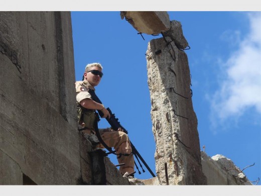 Luke Abroue keeps an eagle-eye out for possible attacking troops.