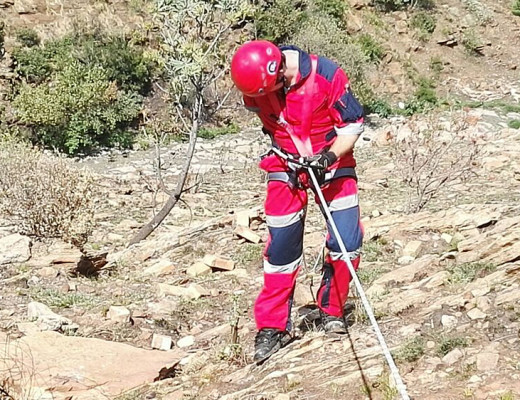 An ER24 member abseiling down the 120 metre cliff in Roodekrans, Krugersdorp.  Photo: ER24