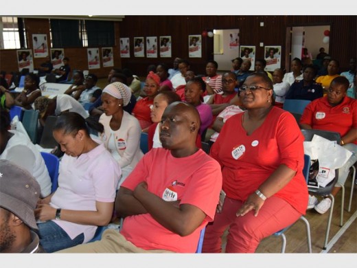 The attentive crowd clad in red and white for the day.