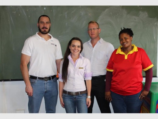 Brad Sumner and Peter Raschel, manager and owner of Sasol Pinehaven together with  Zillah Wihinger-Maguire, Ward 39's councillor and Bertha Moralo, Principal of Kromdraai Toy Library.  Photo: Jessica van Kerken.