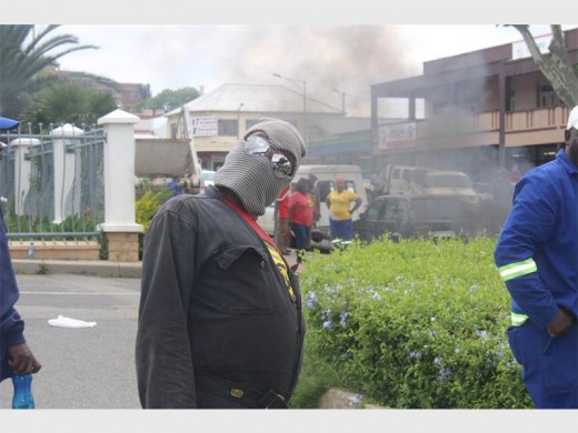 A protester at Town Hall disguised himself after discovering the municipality will not be paying its employees the three percent bonus they allegedly promised.