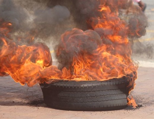 All entrances of the grounds to Town Hall were blocked with burning tyres to keep municipal employees from leaving the site.