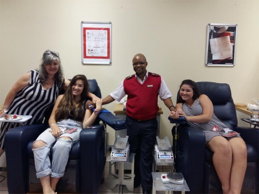 Dana and Demitra Gray, with Thapelo Maroane and Mikayla Gray,  just after Demitra and Mikayla had donated.