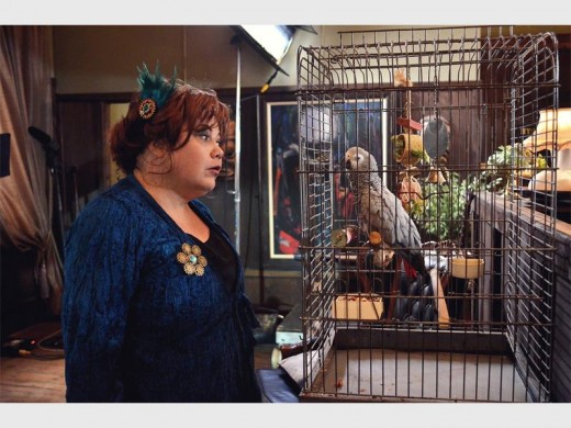 Bonnie (Lizz Meiring) with her parrot, Napoleon. Photo: Submitted.