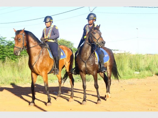 Two officers patrolling a dirt road next to the R28 near Silverstar Casino to ensure the area is cleared of illegal immigrants, robbery suspects and homeless men.