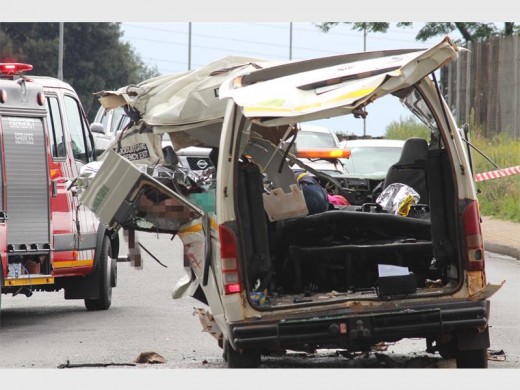 The taxi was written off after it collided with a truck on the R24. Deceased passengers of the taxi were left in the front of the taxi while officials waited for regional police to arrive on scene.
