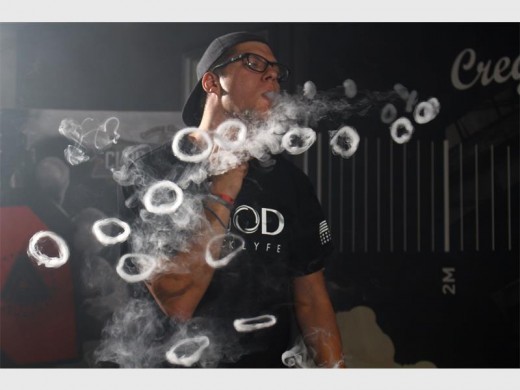 JP Trauernicht demonstrated the playful side of vapers. Vapes produce more, thicker smoke than cigarettes and hubblies, allowing cloud masters to blow smoke rings and play with them.