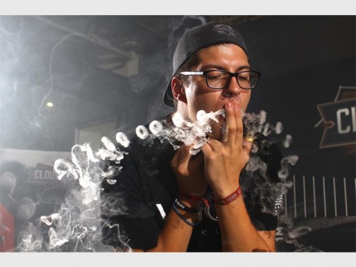JP Trauernicht, cloud master, showing off his vaping skills by blowing two rows of rings simultaneously.