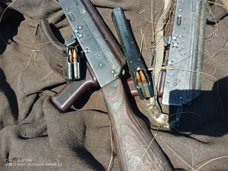 A suspected illegal miner was arrested in Magaliesburg with AK-47s, loaded magazines, and 15 tons of gold-bearing material.