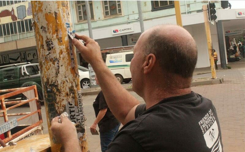 Krugersdorp Full Gospel Church and community partners unite to remove illegal CBD posters and push for the restoration of the town’s busiest streets.
