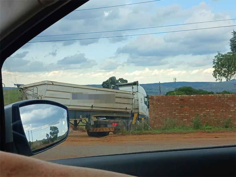 Councillor Gwen Britz warns motorists to avoid the sinkhole area and not to move barriers, as the road could collapse under vehicles.
