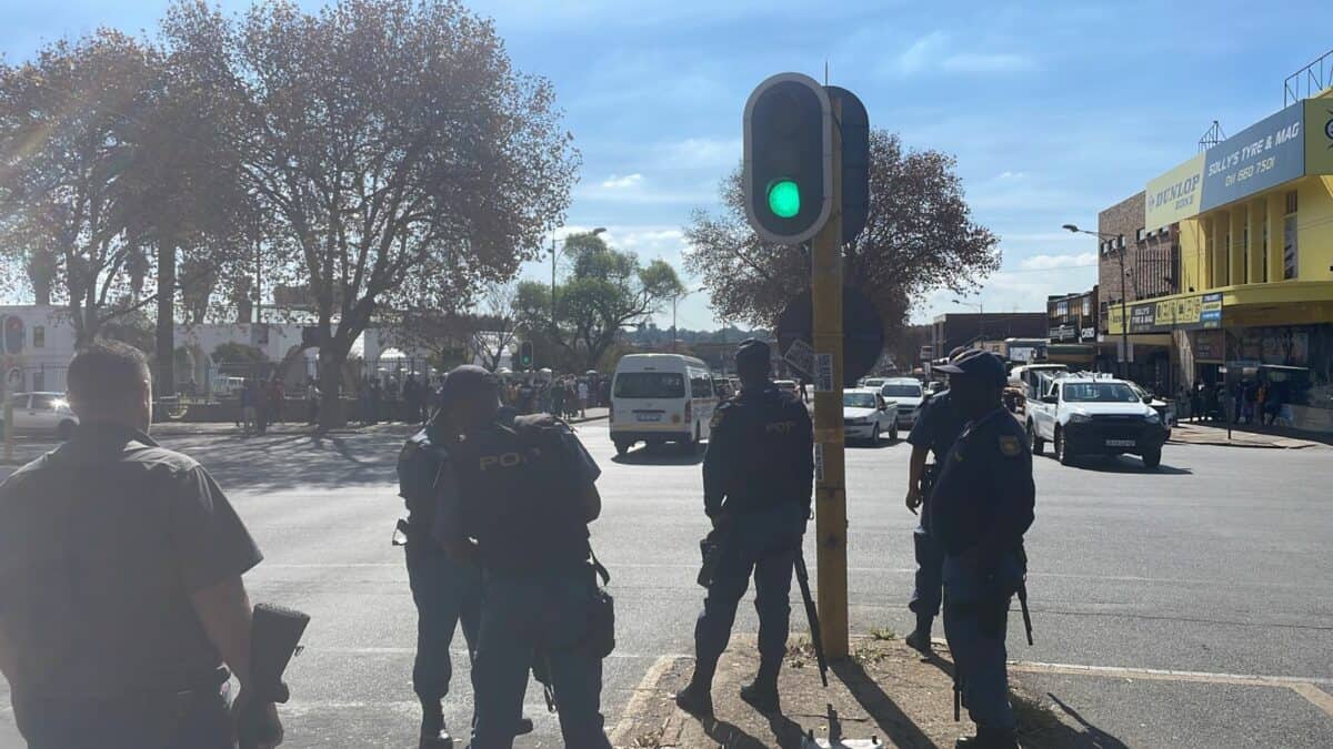 Law enforcement officials are monitoring a protest movement as crowds make their way through the Krugersdorp CBD towards the Town Hall.