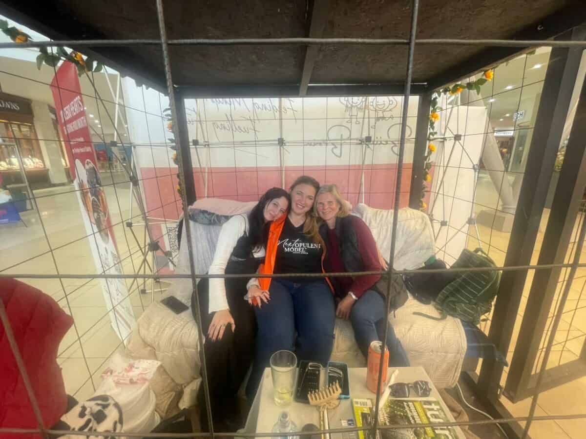 Come and meet the woman who locked herself in a cage to help raise funds for 20 000 peanut butter and jam sandwiches.