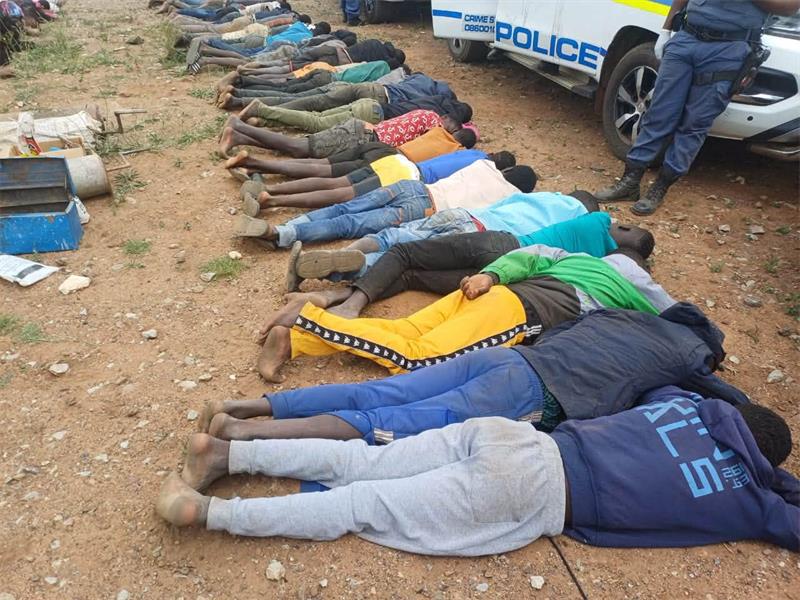 Police and military units execute a targeted crackdown as multidisciplinary forces recover firearms, ammunition, and heavy equipment in Krugersdorp.