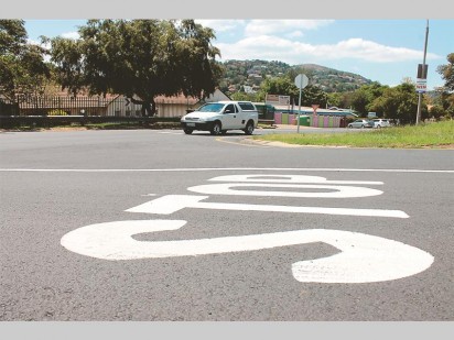 One of the many new stop signs painted.