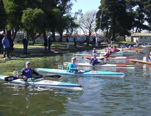 line up for their race -  from age 7 to 12 years -Gauteng Canoe Union School League race at Germiston Lake on 1 August - foreground Matthew van der Matthew No. 46 - Silver Medallist Under 12 boys 