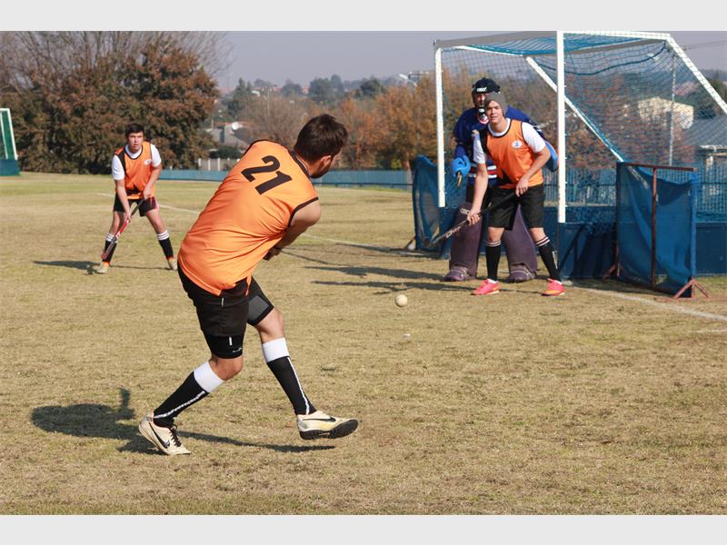 Duan Koekemoer, a midfield player from RHC taking a shot at goal during their warm-up before taking on the Cambrians Hockey Club. File photo/ Roxy de Villiers