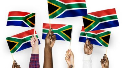 hands-waving-flags-south-africa (Medium)