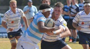 Clinton Agu carries the ball into contact. Photo Logan Frey.(1)