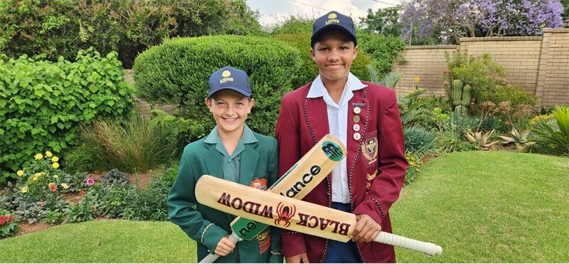 David Holland and Rico Henning, neighbours with a shared vision, celebrate their Lions cricket colours.