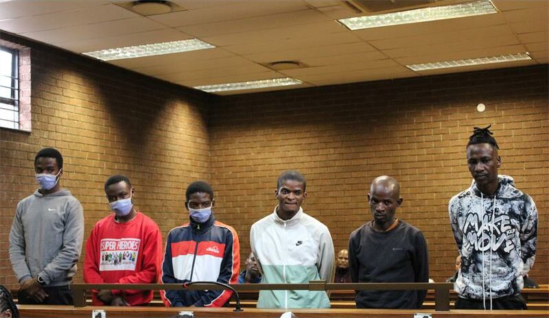 A brief court appearance ended in another postponement for the six accused in the Fleurs murder case.