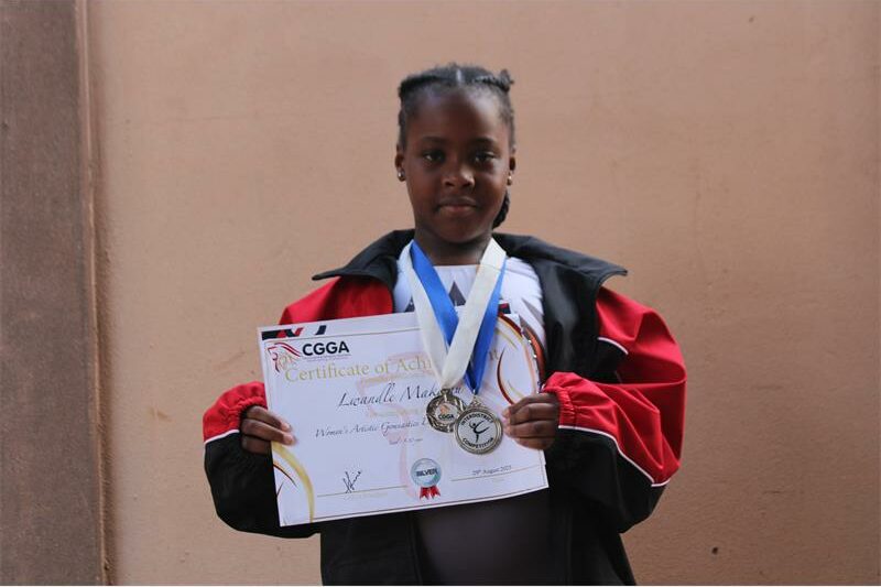 La Salle College learner Lwandle Makamu bags a silver certificate.