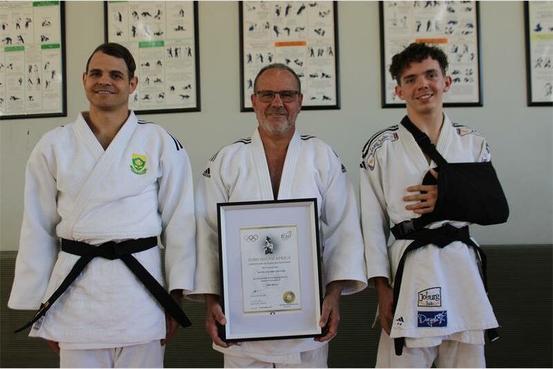 A coach and a judoka graded to their first Dan while head instructor Sensei Danie Bruwer graded to 7th Dan.