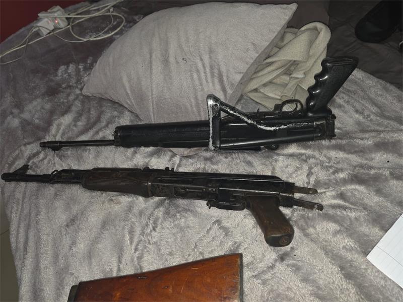 Police recovered an unlicensed AK-47 and a .308 semi-automatic rifle.