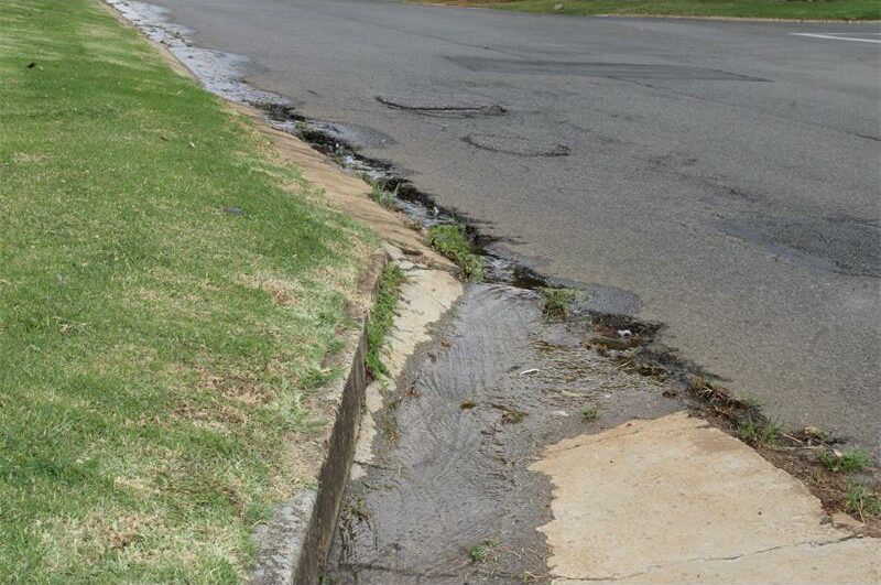 The weeks of uncontrolled water flow have left one resident worried about damage and water loss while she waits for the issue to be addressed.