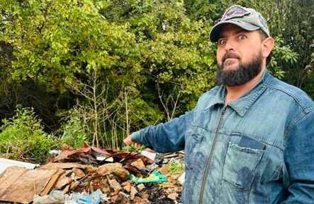 A resident is concerned that the illegal dumping threatens road access and safety.