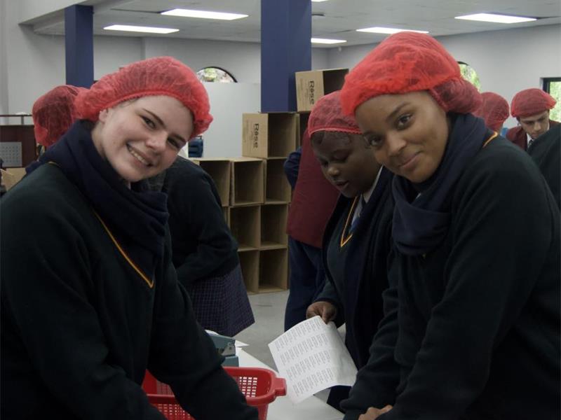 With every meal packed, the learners shared a message of hope and love to children they may never meet.