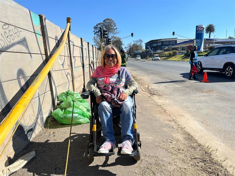 An effort to clear a path for a wheelchair user grew into one of the area's largest community clean-up operations in recent years.
