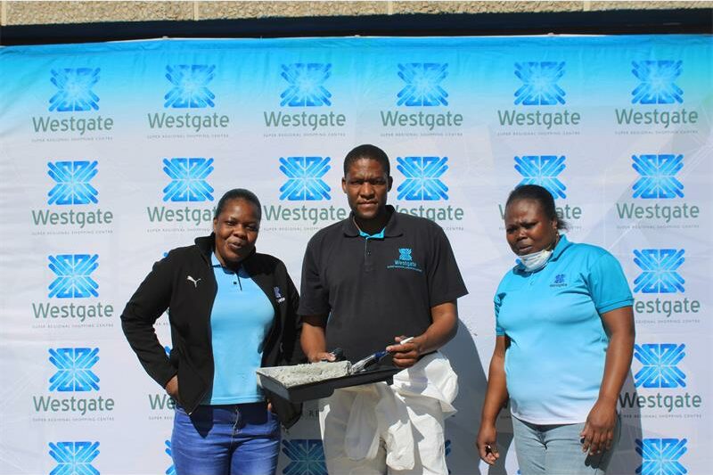 The teams renovated computer labs and donated soccer kits to three local schools during their 67 minutes of service.