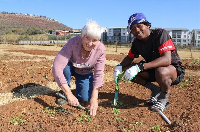 The spirit of Ubuntu filled the garden site as participants spent their 67 minutes planting seeds that will produce food for families in need.