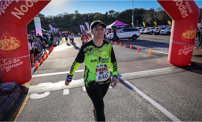 A local runner records her fastest 10km run in her running journey.