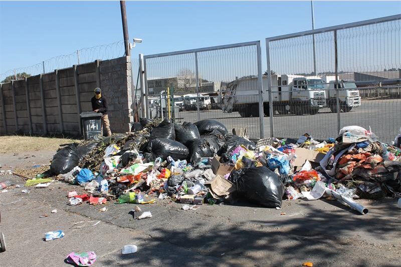 Refuse collection delays persist as recruitment uncertainty and protest action leave thousands of residents waiting for services.