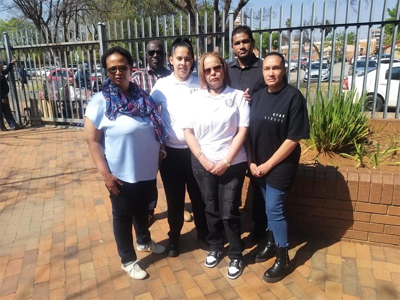 The driver claiming mechanical failure faces prosecution after 13 postponements in a collision that killed three young people.