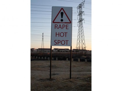 On Tuesday night, anonymous members of the community placed this sign at the intersection of Palliser and Aitken roads.