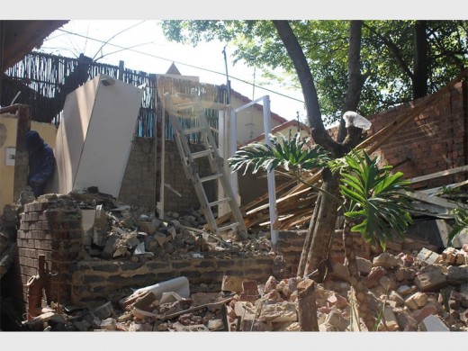 Contractors are on-site, demolishing the unapproved structure on the property.