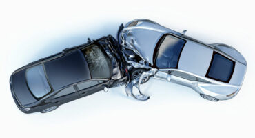 Two cars crashed in accident. Viewed from the top.