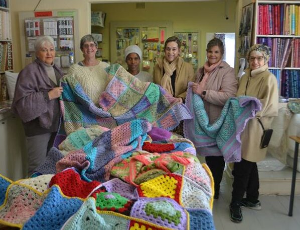 Seven blankets and baby clothing were handmade by Edenvale residents to support Child Welfare South Africa and Tree of Hope.