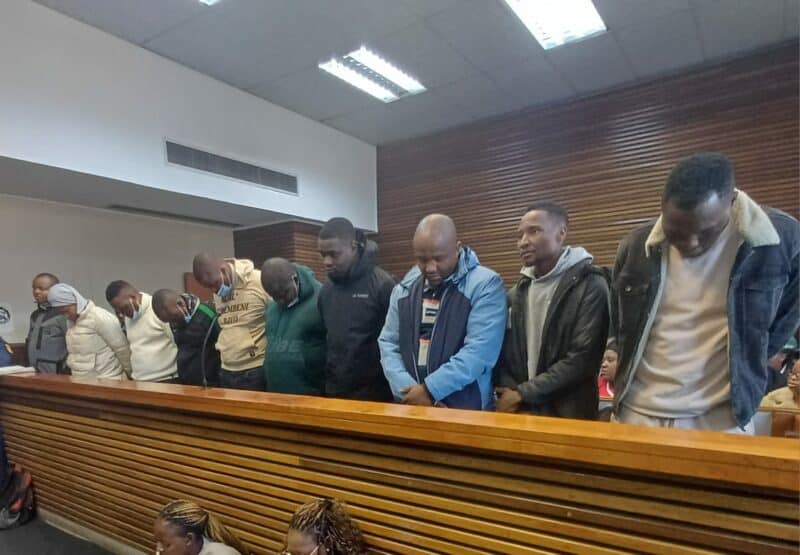 The 10 accused SAPS and EMPD officers in the dock in Court D at the Germiston Magistrates’ Court. Photo: Stephan Lehman.
