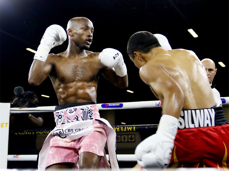 By the end of the fourth round, the writing was on the wall, and the Botswana boxer's corner threw in the towel.